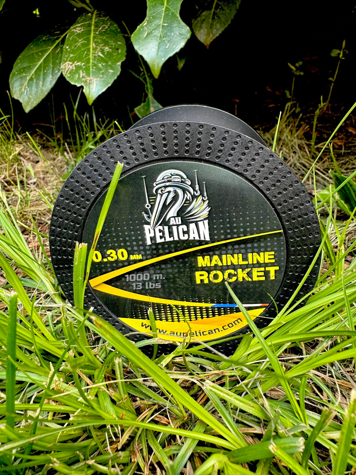 Bobine de fil de nylon ROCKET, support noir avec étiquette Mainline Rocket