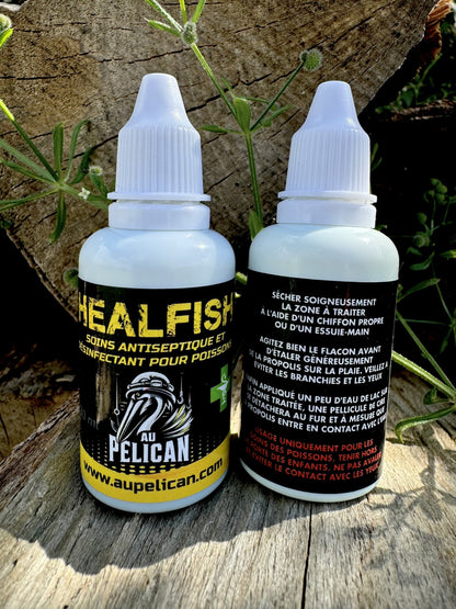 Paire de flacons Heal Fish 30 ml antiseptiques, bouchons blancs, étiquettes vertes.