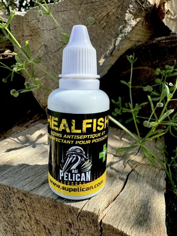 Flacon Heal Fish 30 ml antiseptique pour poisson, étiquette jaune et verte.